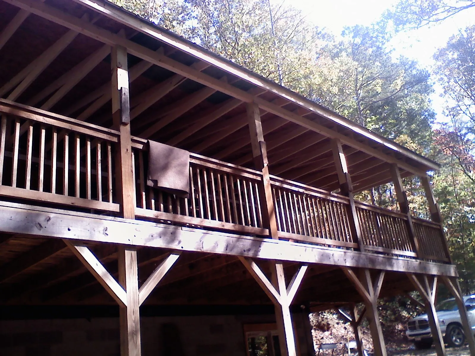 Timber framing under a new elevated porch and deck — Roof Leak Repair in Douglass by Roofing Brothers